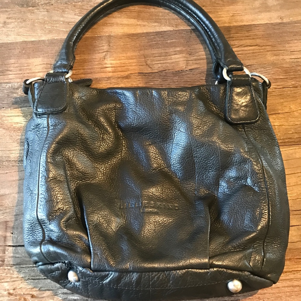 Liebskind black purse. Excellent condition! Great used condition. Only very mino